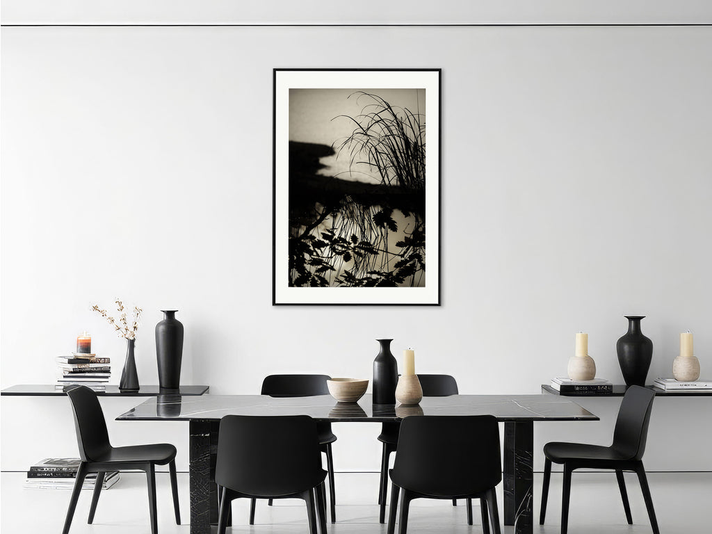 Soulscapes 8 by Andrea Christl, tranquil black-and-white art photography of tall grass and clouds reflected in calm water, professionally framed.